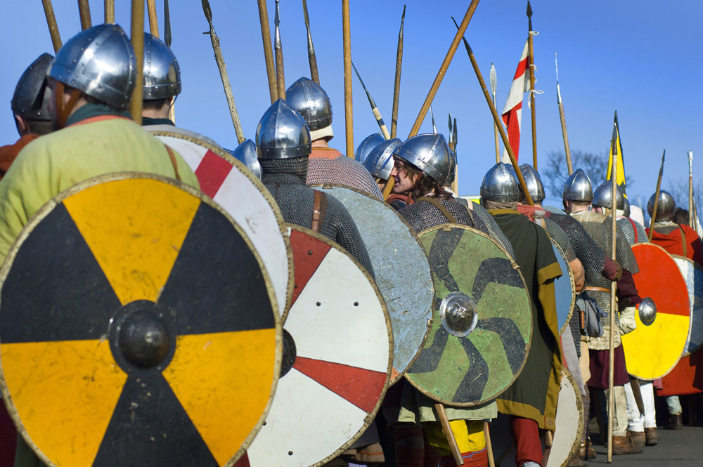 Line of vikings shields and blue skies