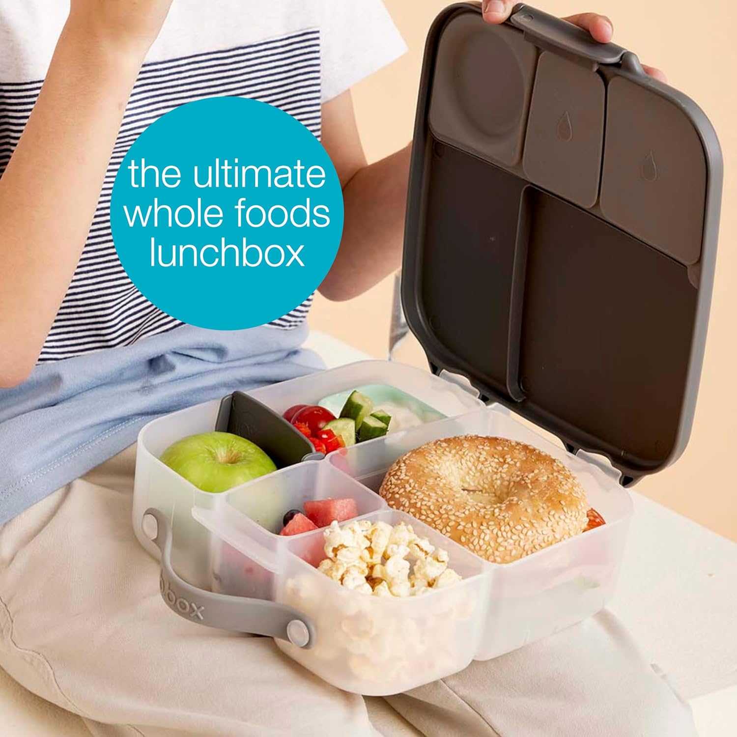 A person holding a lunch box with food in itAI-generated content may be incorrect.