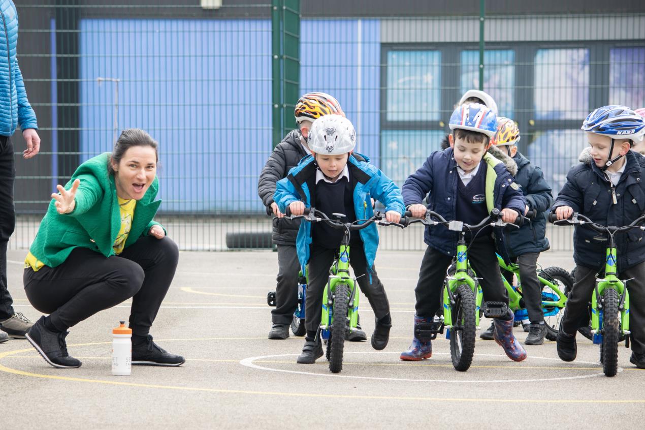 Dame Sarah with pupils at Silver Springs Primary 