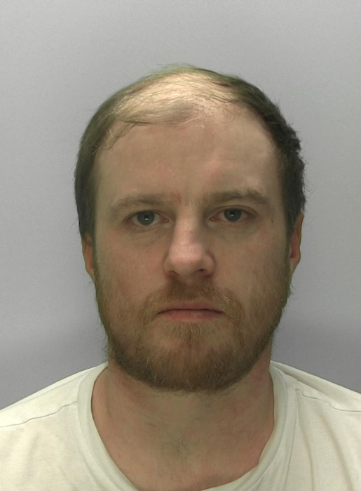 Custody image of Adam Liddiard
