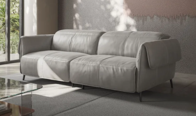 A couch in a roomAI-generated content may be incorrect.