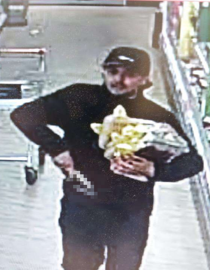 Photo of Ahmed with knife