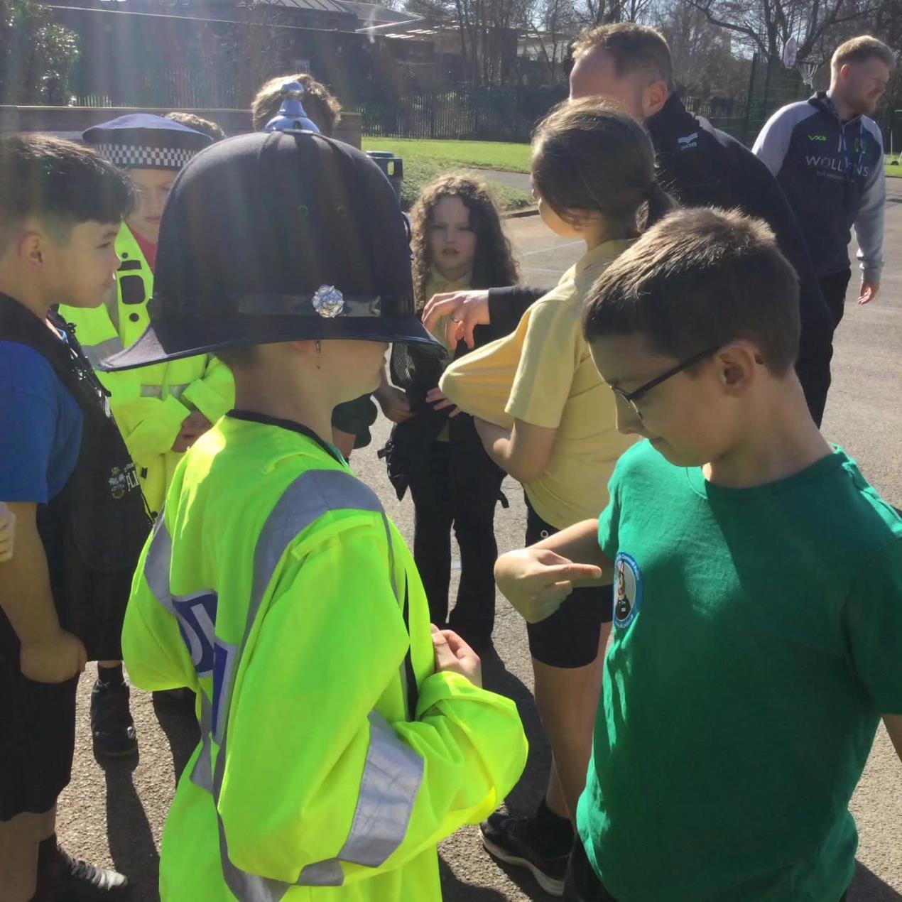 Child in high vis and hat