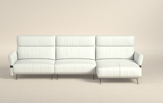 A white couch in a roomDescription automatically generated