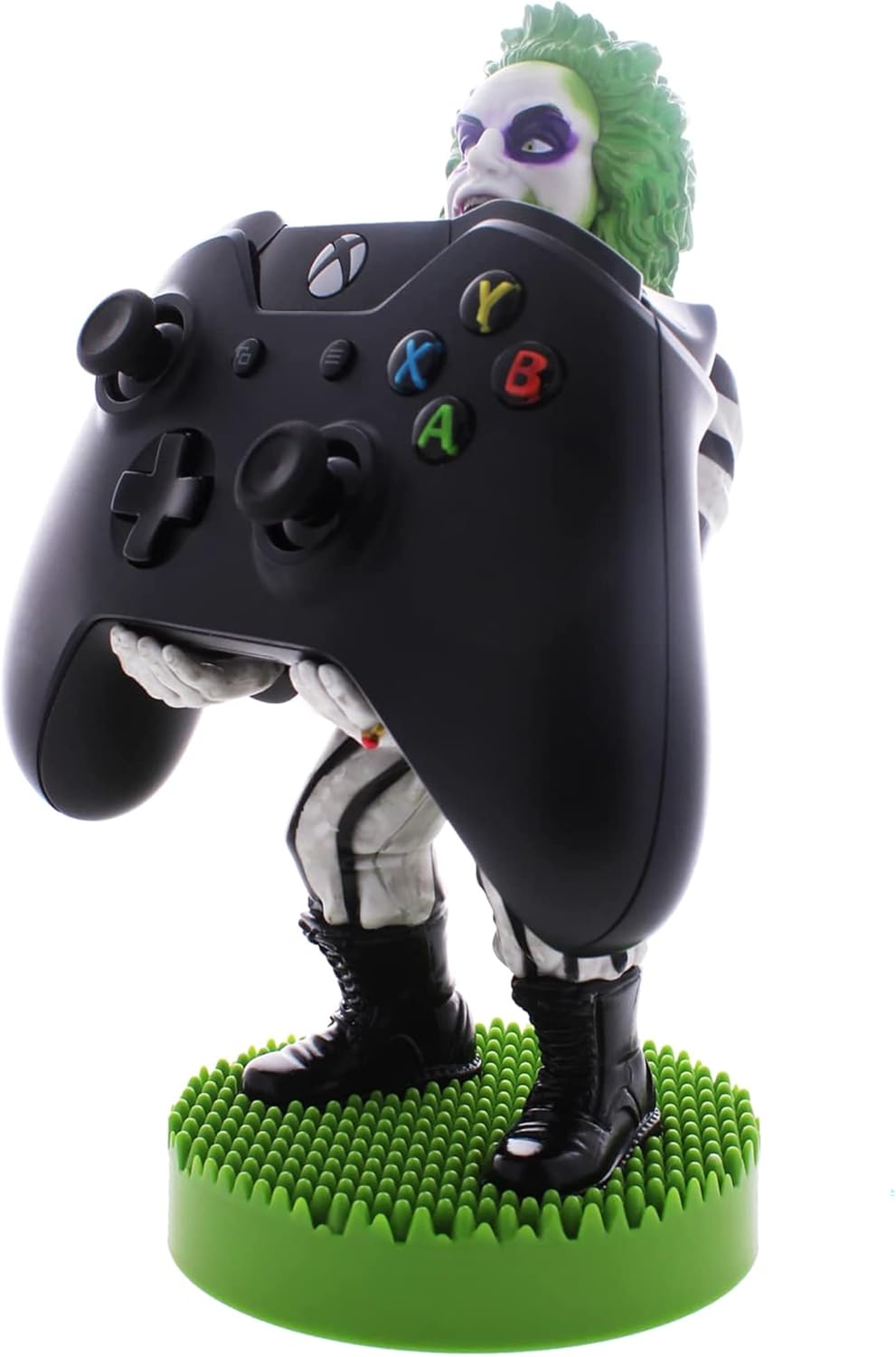 A video game controller with a green and white garmentDescription automatically generated