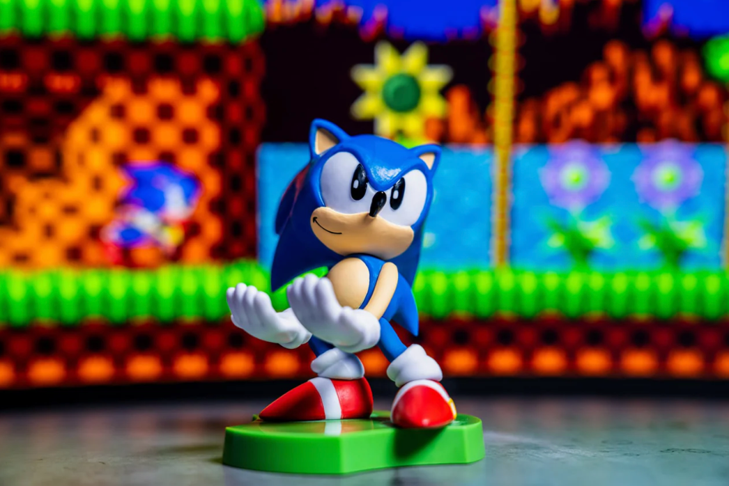 A toy figurine of a blue hedgehogDescription automatically generated