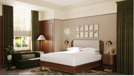 A bedroom with a bed and a green couchAI-generated content may be incorrect.
