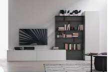 A tv on a shelf in a roomAI-generated content may be incorrect.