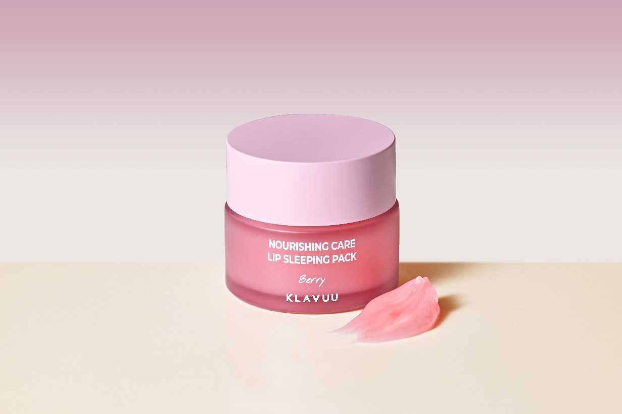A pink container with a pink lid and a pink lip balmDescription automatically generated
