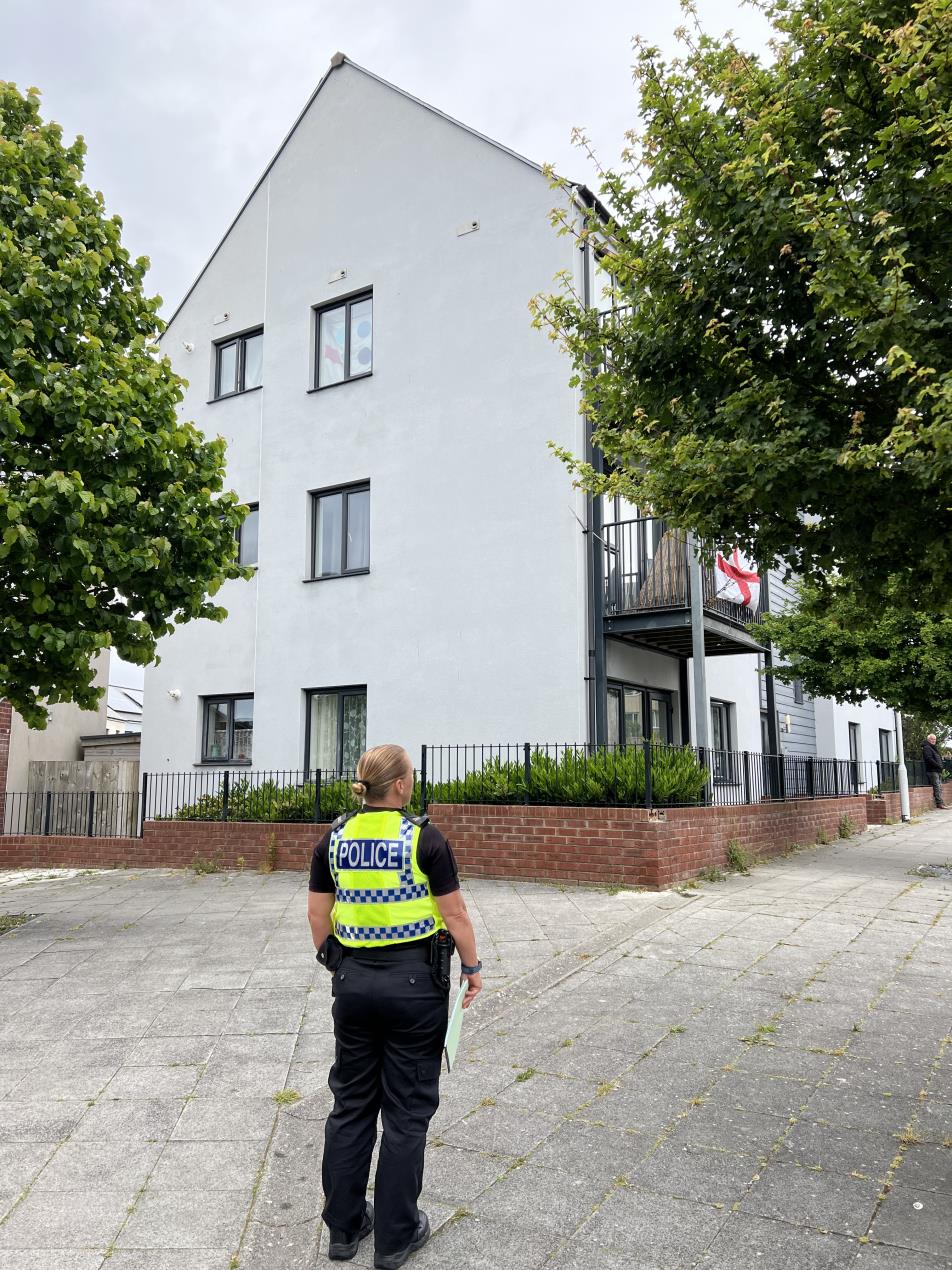 Scorpion8 05 Officer outside property