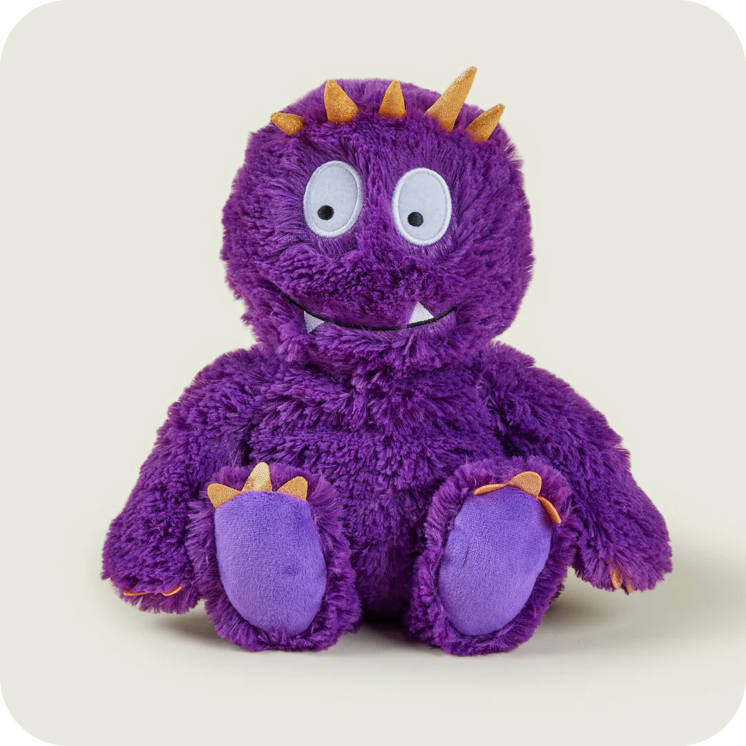 A purple stuffed animal with a white backgroundDescription automatically generated