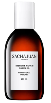 A brown bottle with white labelDescription automatically generated