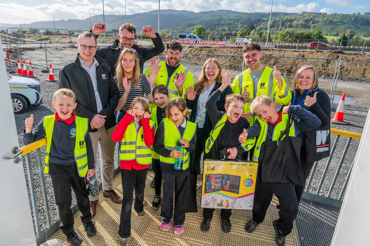 Pupils and teachers from Logierait Primary School, alongside staff from Transport Scotland and Wills Bros, celebrate the opening of the Community Skills Hub   
