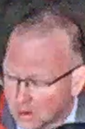 Closely cropped image of man's face