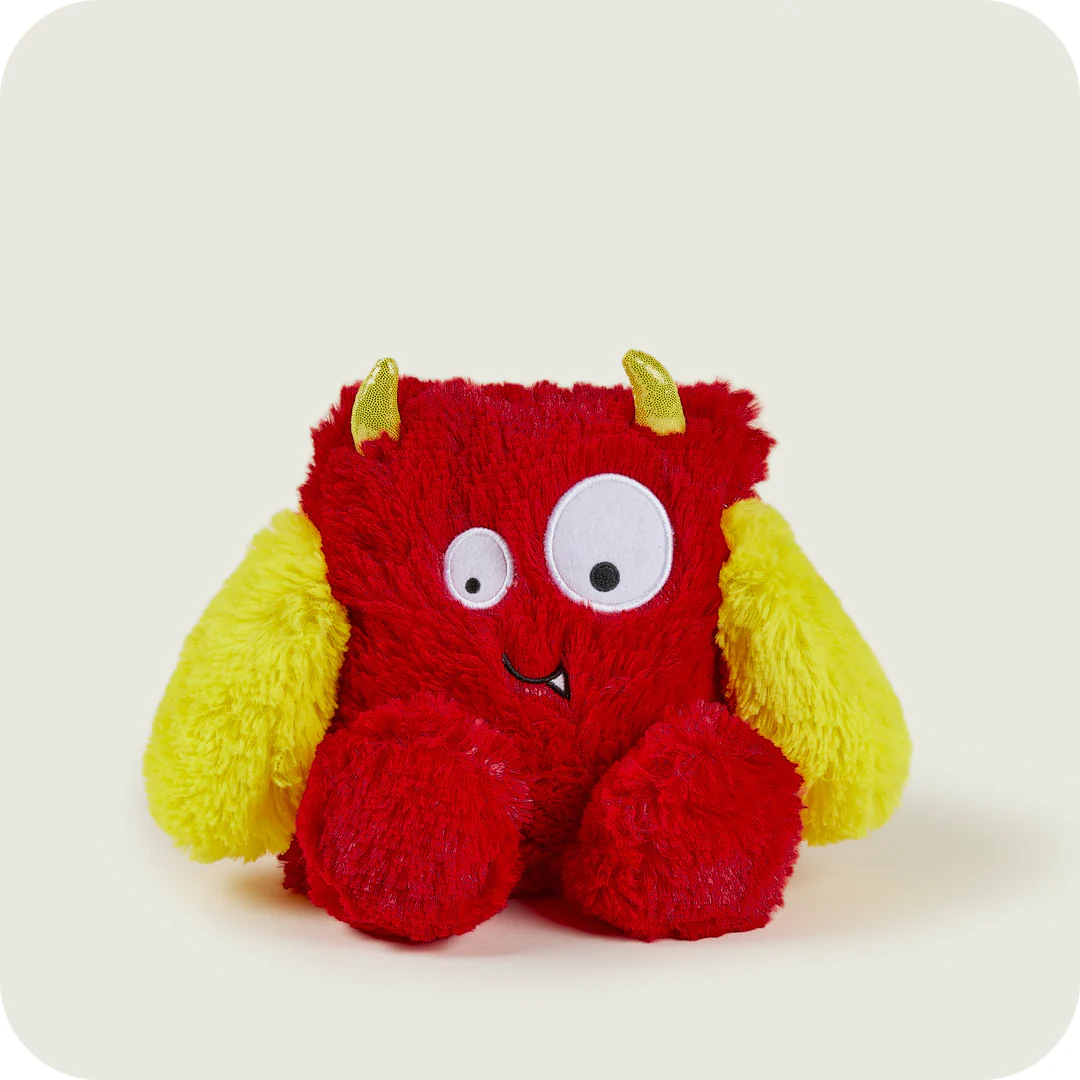 A red and yellow stuffed animalDescription automatically generated