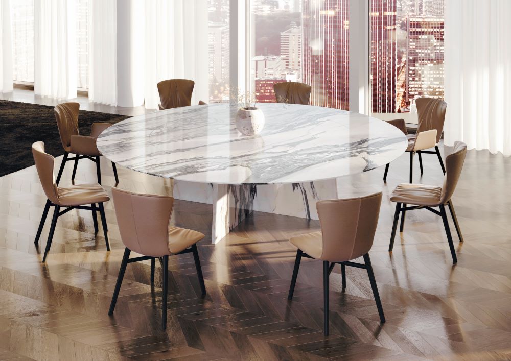 A room with a marble table and chairsDescription automatically generated