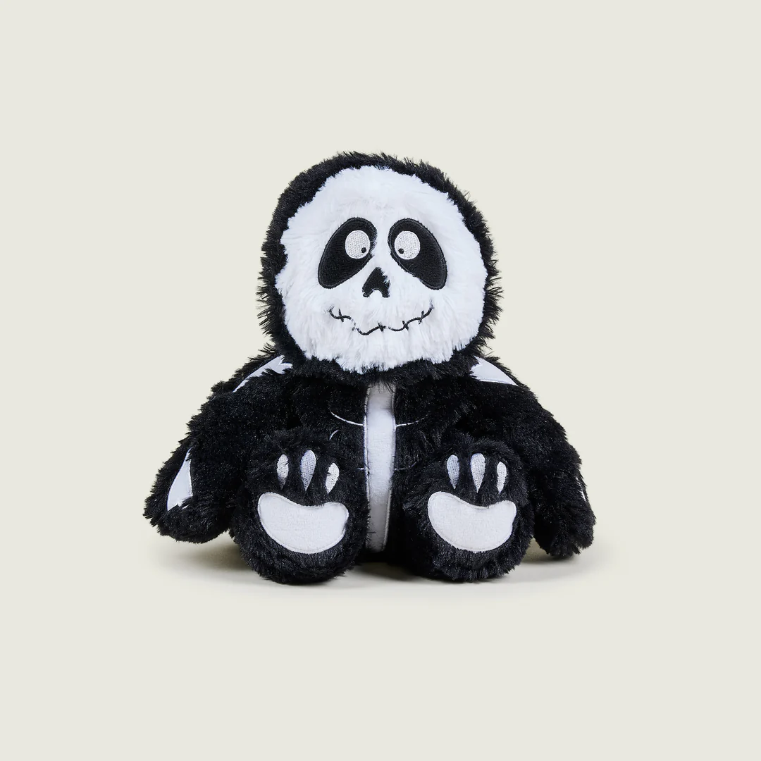 A black and white stuffed animalDescription automatically generated