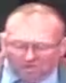 Closely cropped image of man's face